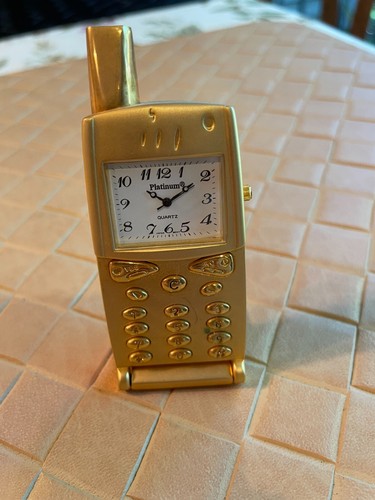 Miniature clock cell flip - clock,